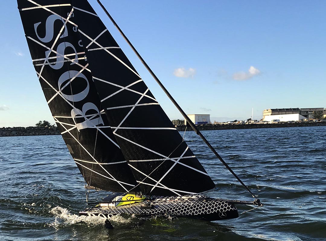 Carbon fiber highlighted in this miniature racing sailboat